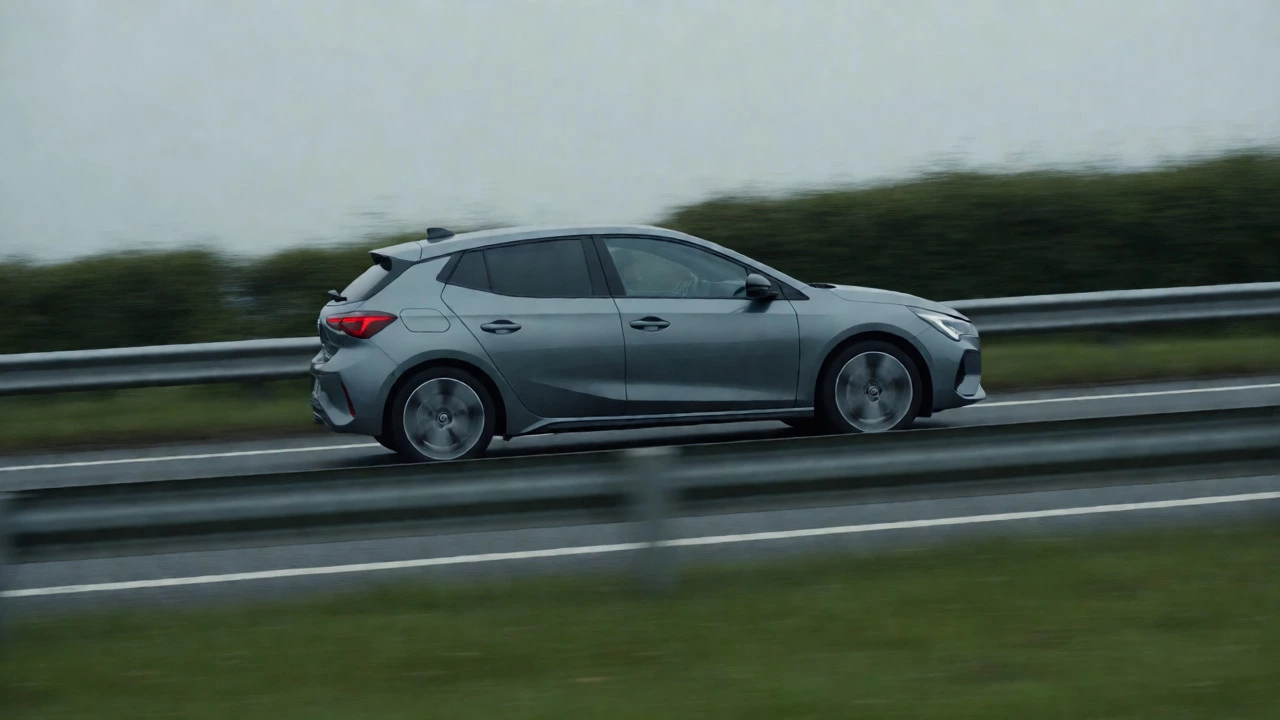 Car emitting black smoke while driving sluggishly on a motorway